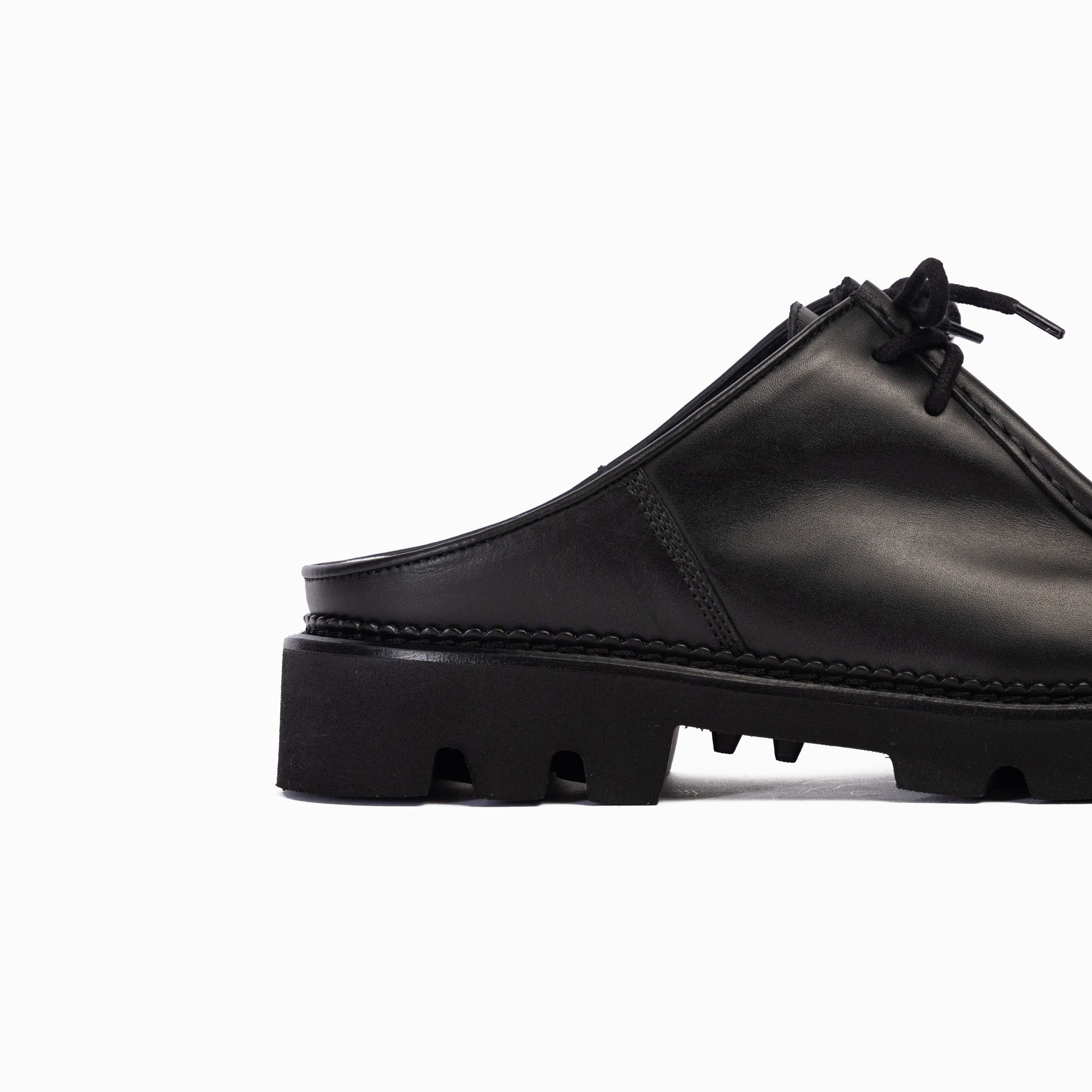 Collegium Pillar Moc-toe Derby Mule in Nero Leather