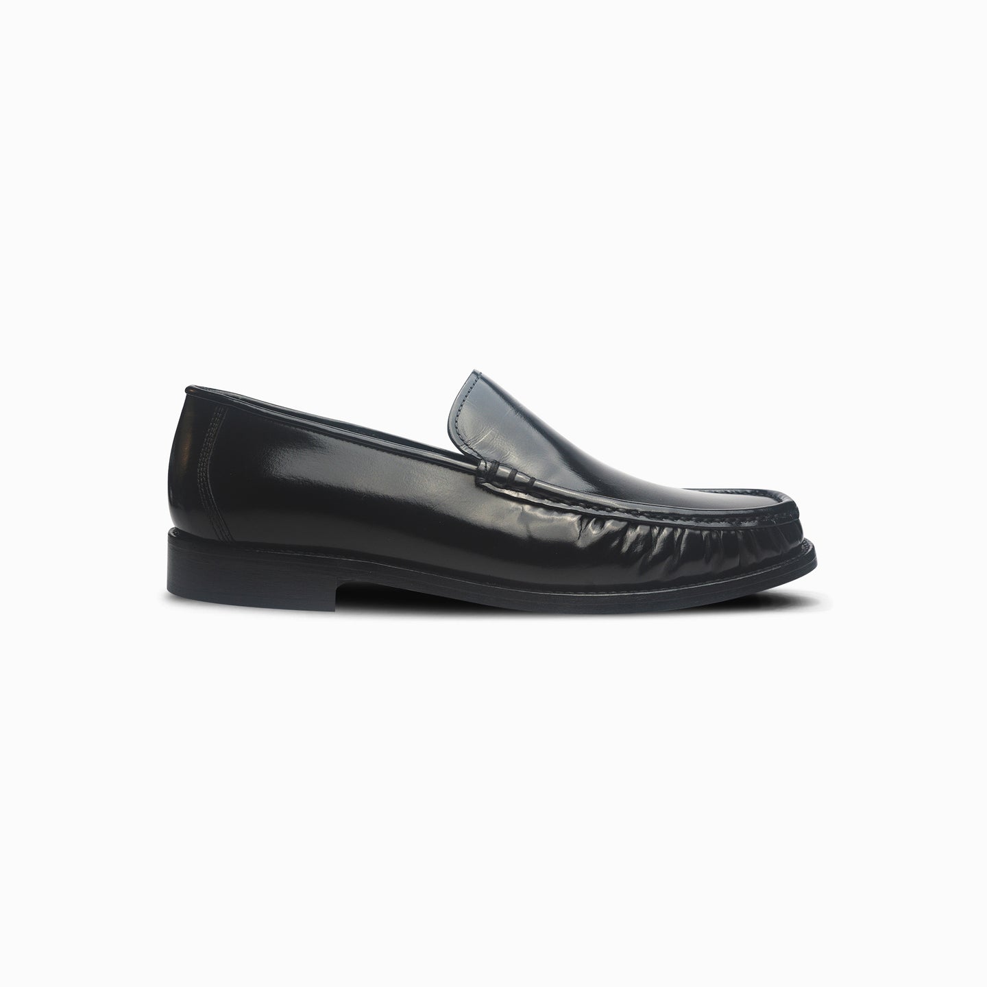 Black loafer shoe on a white background